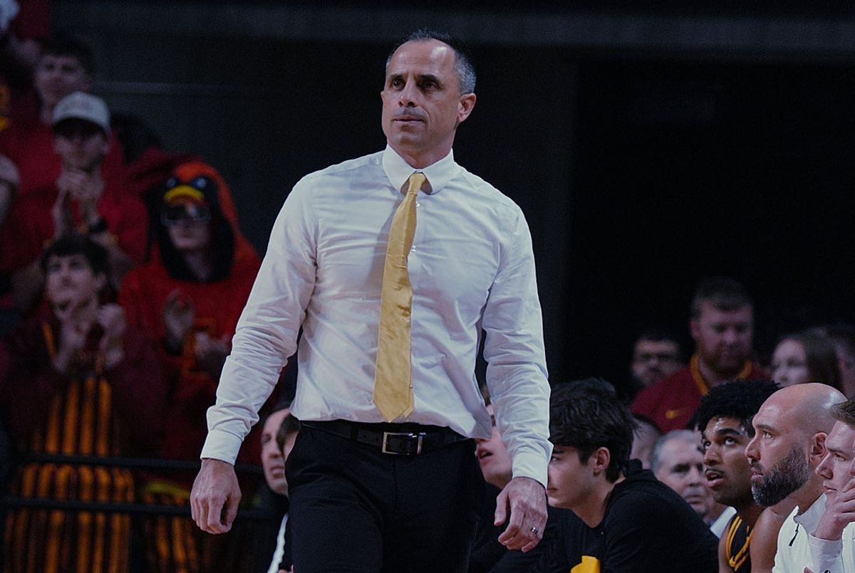 Iowa Hawkeyes men's basketball head coach Ben McCollum watches the game from the side lineduring the second half in the men’s basketball Cy-Hawk series on Dec. 11, 2025, in Ames, Iowa.