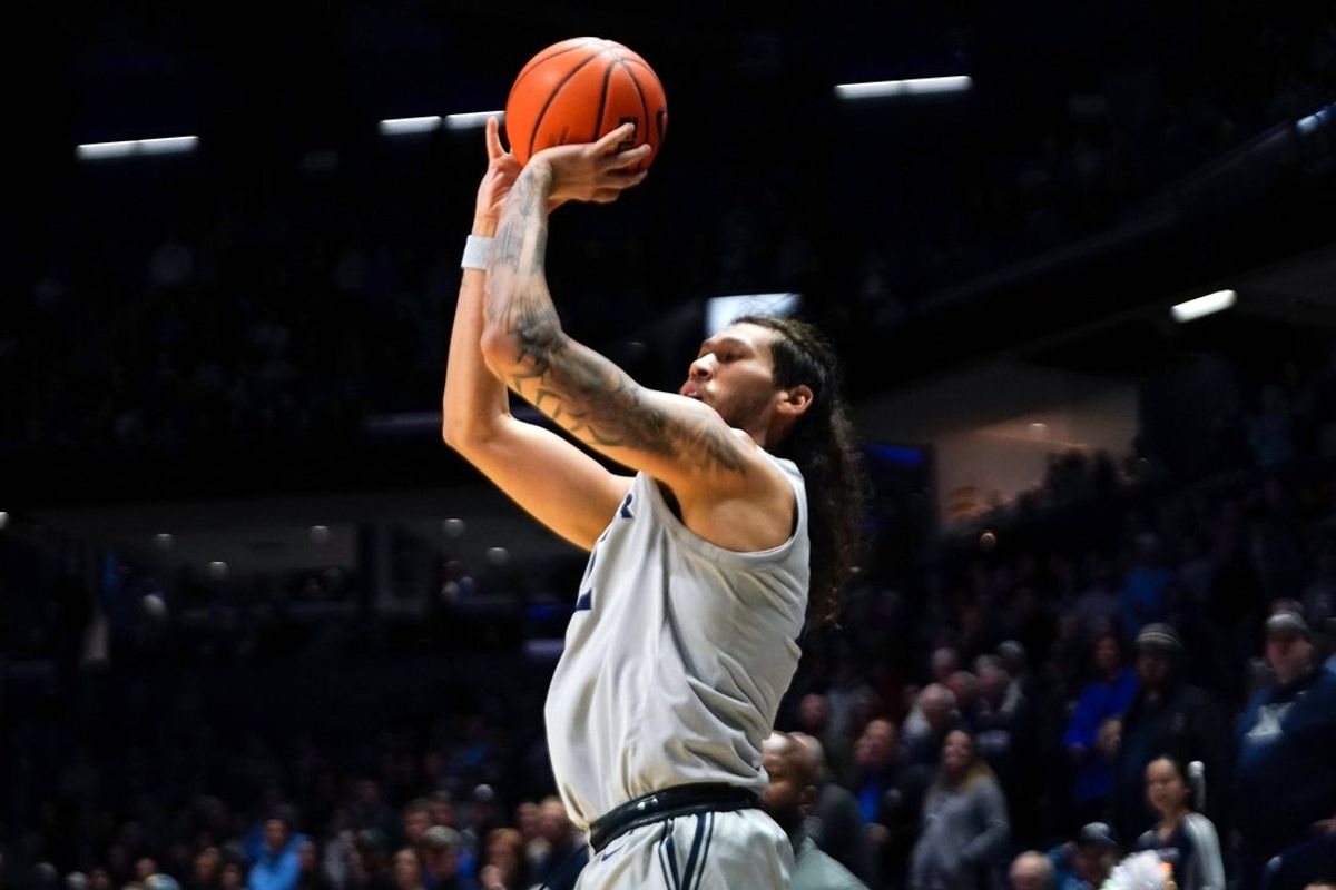 Xavier Musketeers forward Tre Carroll (12) hits a shot from three point range in the first half of a NCAA men’s basketball game between the Xavier Musketeers and Missouri State Bears, Friday, Dec. 12, 2025, at Cintas Center in Cincinnati.