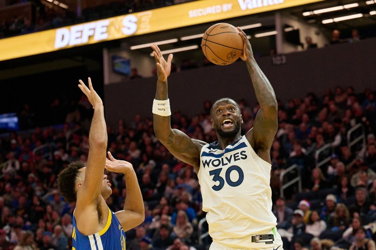 Dec 12, 2025; San Francisco, California, USA; Minnesota Timberwolves forward Julius Randle (30) shoots the ball against Golden State Warriors forward Trayce Jackson-Davis (32) during the fourth quarter at Chase Center. Mandatory Credit: Robert Edwards-Imagn Images