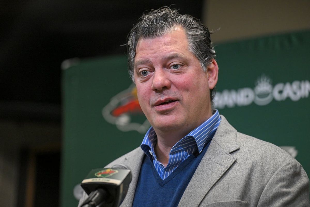 Dec 13, 2025; Saint Paul, Minnesota, USA;  Minnesota Wild general manger Bill Guerin addresses the media about acquiring defensemen Quinn Hughes via trade from the Vancouver Canucks before a game against the Ottawa Senators at Grand Casino Arena. Mandatory Credit: Nick Wosika-Imagn Images