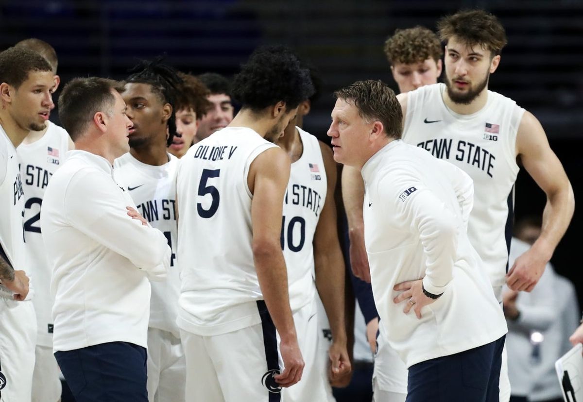 Dec 13, 2025; University Park, Pennsylvania, USA; Penn State Nittany Lions head coach Mike Rhoades talks to his players during the second half against the Michigan State Spartans at Bryce Jordan Center. Mandatory Credit: Matthew O'Haren-Imagn Images