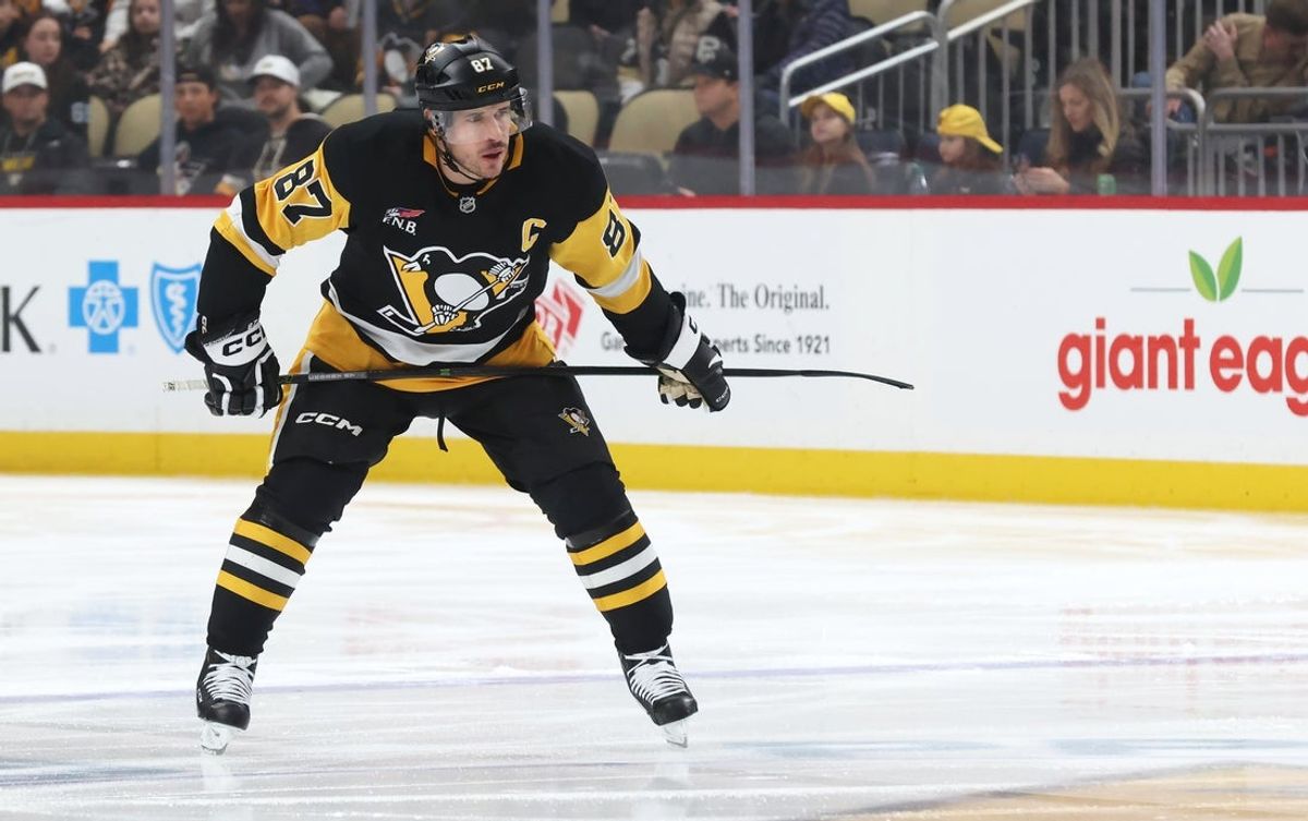 Dec 13, 2025; Pittsburgh, Pennsylvania, USA;  Pittsburgh Penguins center Sidney Crosby (87) prepares to take the opening face-off against the San Jose Sharks during the first period at PPG Paints Arena. Mandatory Credit: Charles LeClaire-Imagn Images