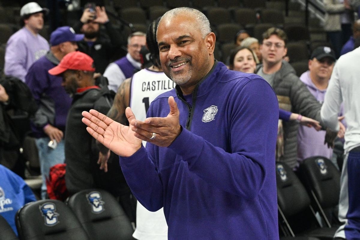 Dec 13, 2025; Omaha, Nebraska, USA;  Kansas State Wildcats head coach Jerome Tang congratulates his players after a win against the Creighton Bluejays at CHI Health Center Omaha. Mandatory Credit: Steven Branscombe-Imagn Images