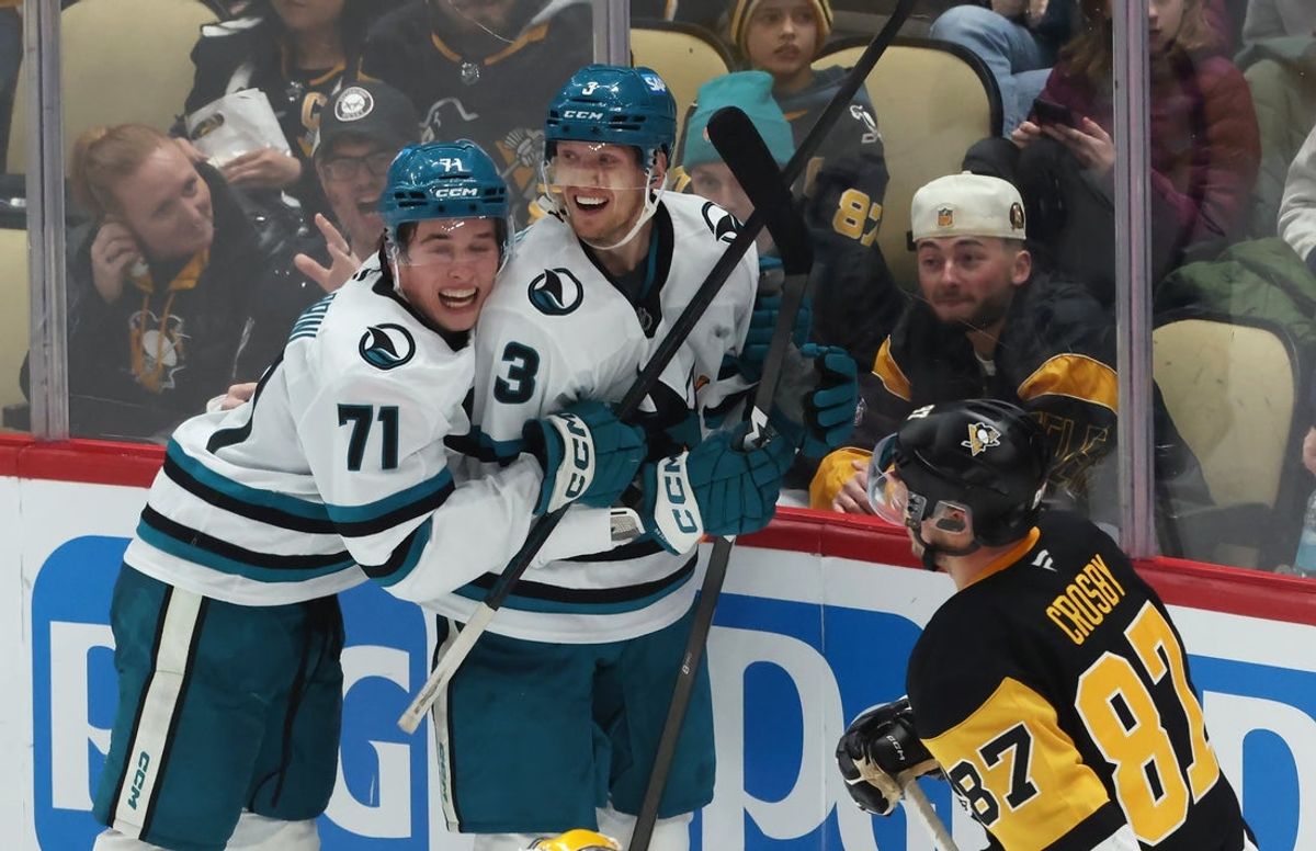 Dec 13, 2025; Pittsburgh, Pennsylvania, USA;  San Jose Sharks center Macklin Celebrini (71) and defenseman John Klingberg (3) celebrate an overtime game-winning goal by  Klingberg to defeat the Pittsburgh Penguins at PPG Paints Arena. Mandatory Credit: Charles LeClaire-Imagn Images