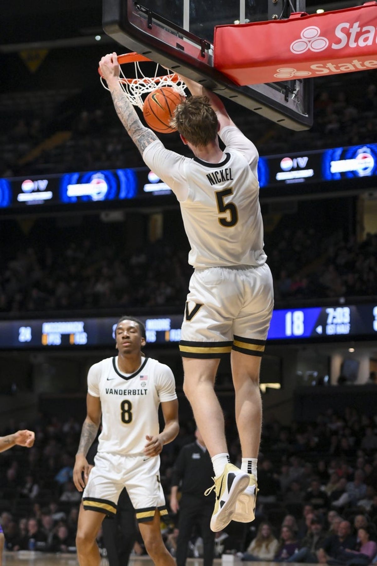 Dec 13, 2025; Nashville, Tennessee, USA;  Vanderbilt Commodores forward Tyler Nickel (5) dunks the ball against the Central Arkansas Bears during the first half at Memorial Gymnasium. Mandatory Credit: Steve Roberts-Imagn Images