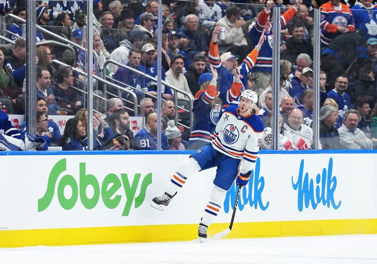 Dec 13, 2025; Toronto, Ontario, CAN; Edmonton Oilers center Connor McDavid (97) celebrates scoring a goal against the Toronto Maple Leafs during the first period at Scotiabank Arena. Mandatory Credit: Nick Turchiaro-Imagn Images