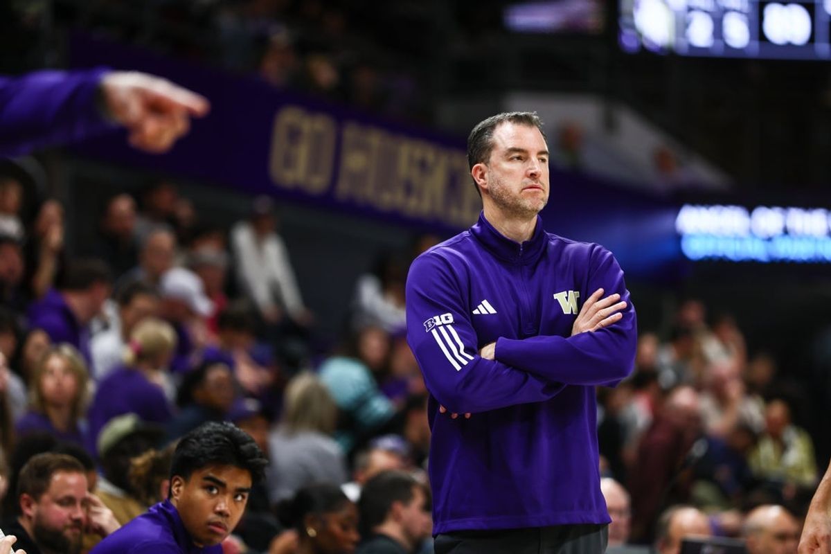 Dec 13, 2025; Seattle, Washington, USA; Washington Huskies head coach Danny Sprinkle looks on during the second half against the Southern Utah Thunderbirds at Alaska Airlines Arena at Hec Edmundson Pavilion. Mandatory Credit: Kevin Ng-Imagn Images