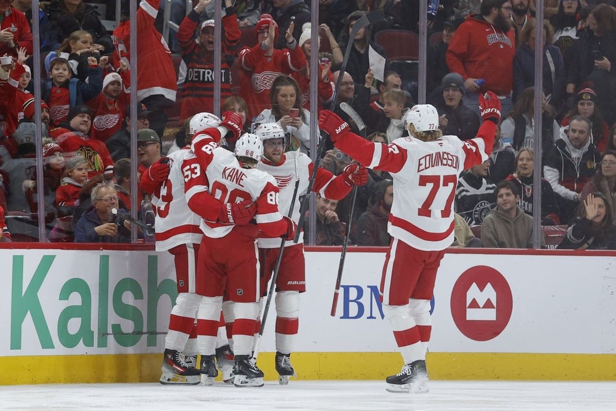 Dec 13, 2025; Chicago, Illinois, USA; Detroit Red Wings right wing Alex Debrincat (93) celebrates with teammates after scoring against the Chicago Blackhawks during the first period at United Center. Mandatory Credit: Kamil Krzaczynski-Imagn Images