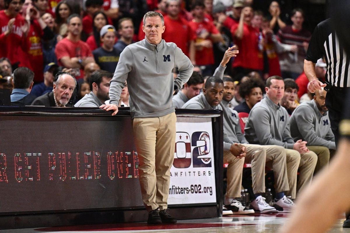 Dec 13, 2025; College Park, Maryland, USA;  Michigan Wolverines head coach Dusty May watches his team play in the first half against the Maryland Terrapins at Xfinity Center. Mandatory Credit: Jamie Sabau-Imagn Images