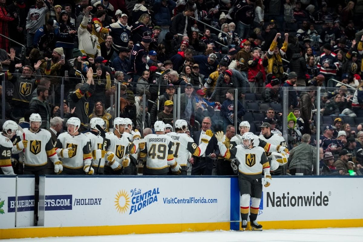 Dec 13, 2025; Columbus, Ohio, USA;  Members of the Vegas Golden Knights celebrate on the bench after defeating the Columbus Blue Jackets at Nationwide Arena. Mandatory Credit: Aaron Doster-Imagn Images