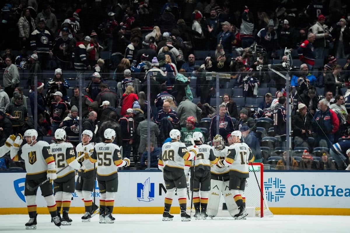 Dec 13, 2025; Columbus, Ohio, USA;  Vegas Golden Knights goaltender Carter Hart (79) celebrates with teammates celebrate after defeating the Columbus Blue Jackets at Nationwide Arena. Mandatory Credit: Aaron Doster-Imagn Images