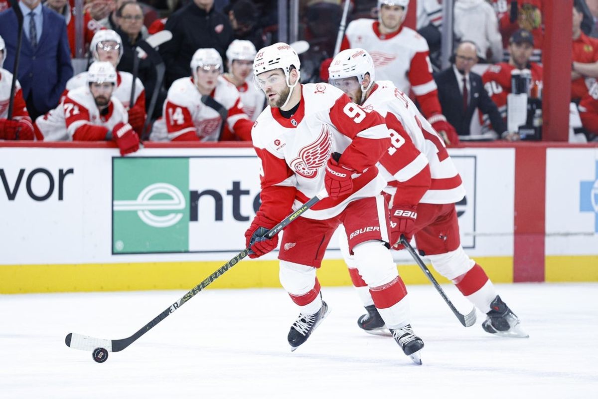 Dec 13, 2025; Chicago, Illinois, USA; Detroit Red Wings right wing Alex Debrincat (93) looks to shoot against the Chicago Blackhawks during the second period at United Center. Mandatory Credit: Kamil Krzaczynski-Imagn Images