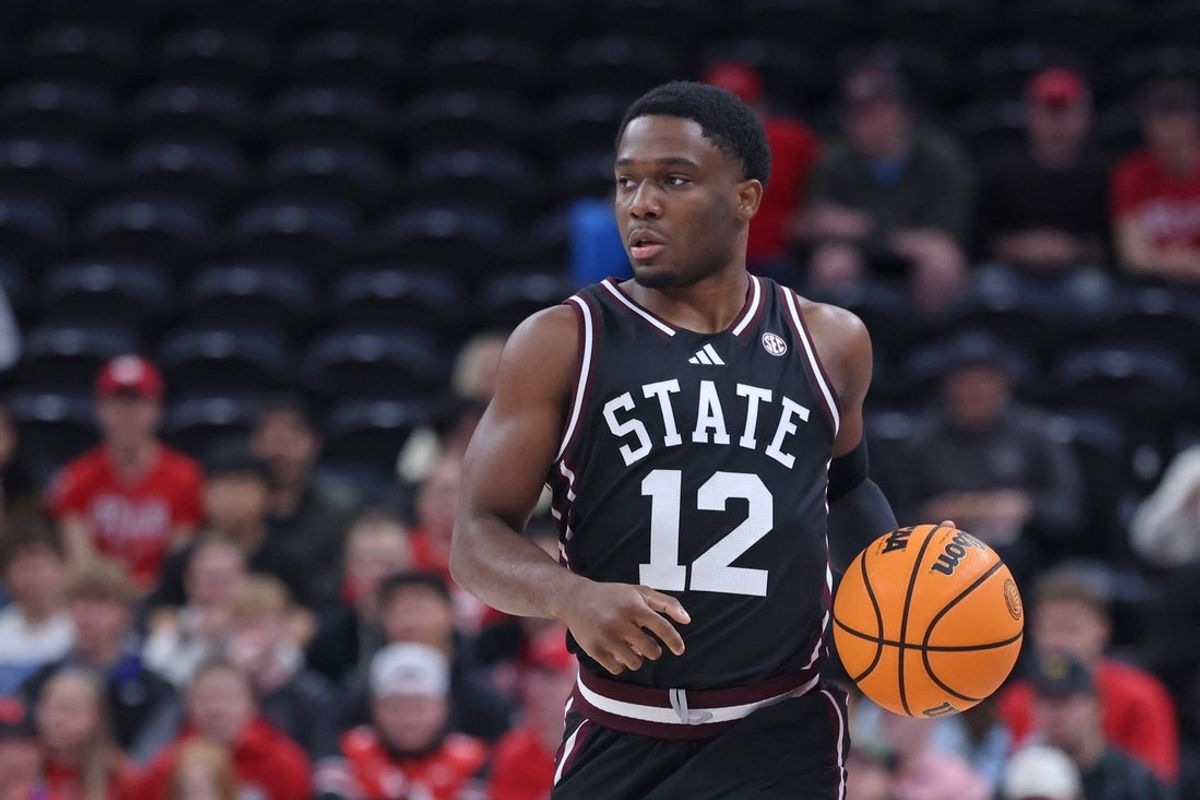 Dec 13, 2025; Salt Lake City, Utah, USA; Mississippi State Bulldogs guard Josh Hubbard (12) brings the ball up the court against the Utah Utes during the first half at Delta Center. Mandatory Credit: Rob Gray-Imagn Images