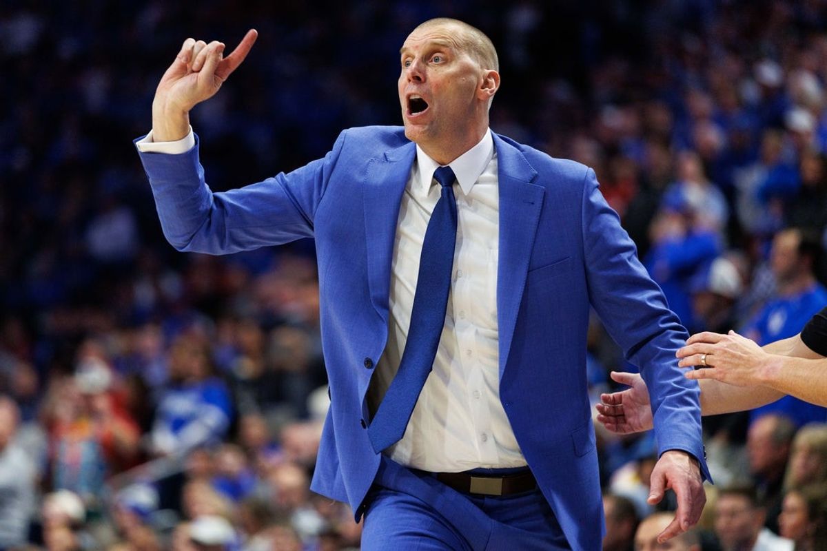 Dec 13, 2025; Lexington, Kentucky, USA;  Kentucky Wildcats head coach Mark Pope yells to his players during the second half against the Indiana Hoosiers at Rupp Arena at Central Bank Center. Mandatory Credit: Jordan Prather-Imagn Images