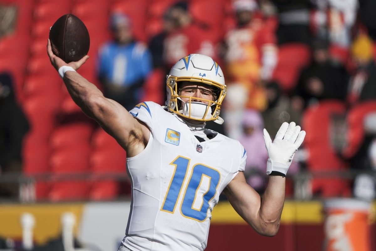 Dec 14, 2025; Kansas City, Missouri, USA; Los Angeles Chargers quarterback Justin Herbert (10) participates in pregame warmups against the Kansas City Chiefs at GEHA Field at Arrowhead Stadium. Mandatory Credit: Denny Medley-Imagn Images