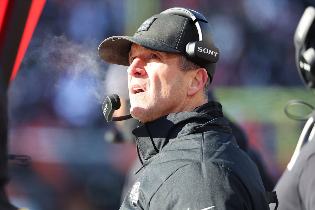 Dec 14, 2025; Cincinnati, Ohio, USA; Baltimore Ravens head coach John Harbaugh checks a replay during the second quarter against the Cincinnati Bengals at Paycor Stadium. Mandatory Credit: Joseph Maiorana-Imagn Images