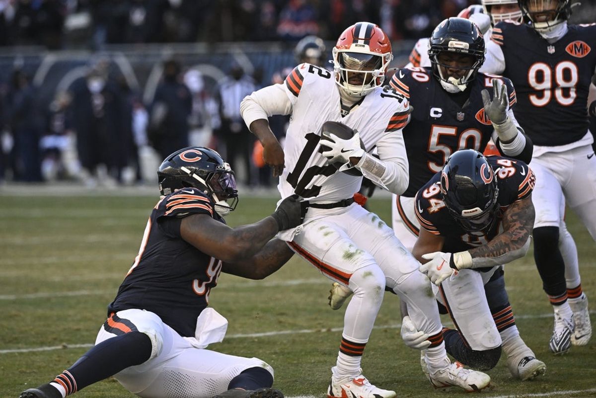 Dec 14, 2025; Chicago, Illinois, USA; Chicago Bears defensive tackle Gervon Dexter Sr. (99) sacks Cleveland Browns quarterback Shedeur Sanders (12) during the fourth quarter at Soldier Field. Mandatory Credit: Matt Marton-Imagn Images