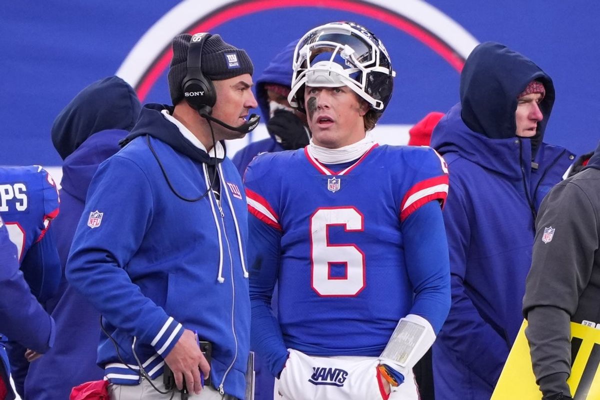 Dec 14, 2025; East Rutherford, New Jersey, USA;  New York Giants quarterback Jaxson Dart (6) talks with interim head coach Mike Kafka during the fourth quarter against the Washington Commanders at MetLife Stadium. Mandatory Credit: Robert Deutsch-Imagn Images