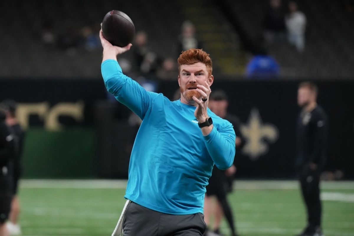 Dec 14, 2025; New Orleans, Louisiana, USA; Carolina Panthers quarterback Andy Dalton (14) warms up before the game against the New Orleans Saints at Caesars Superdome. Mandatory Credit: Matthew Hinton-Imagn Images