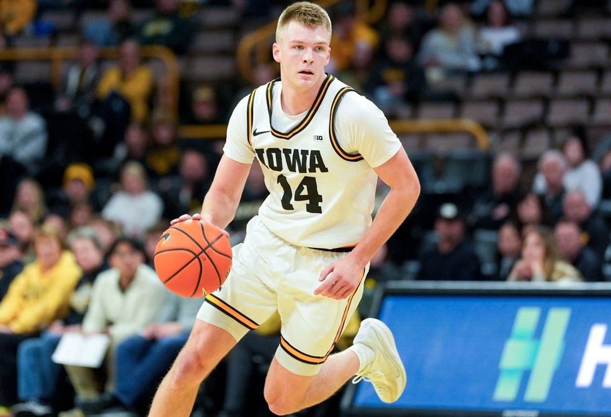 Iowa guard Bennett Stirtz (14) dribbles the basketball during a game against the Western Michigan Broncos Dec. 14, 2025 at Carver-Hawkeye Arena in Iowa City, Iowa.