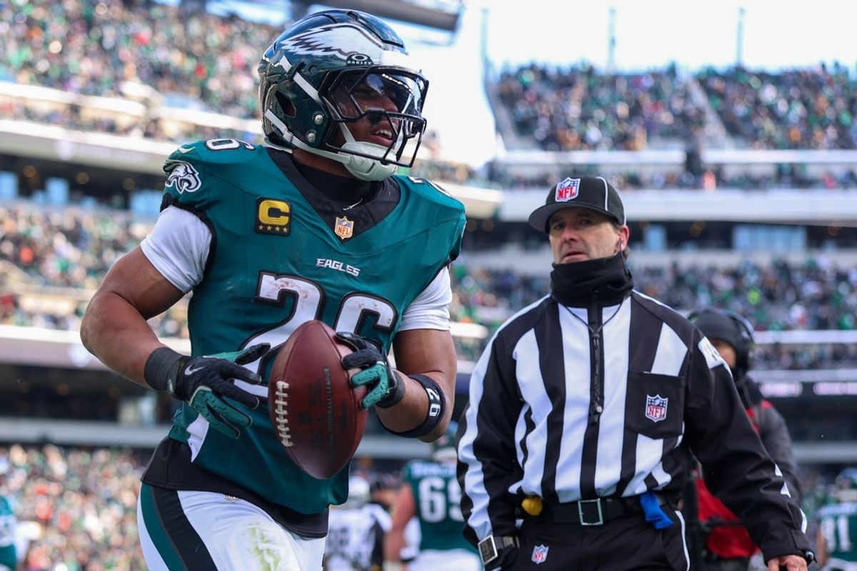 Dec 14, 2025; Philadelphia, Pennsylvania, USA; Philadelphia Eagles running back Saquon Barkley (26) reacts after scoring a touchdown against the Las Vegas Raiders during the second quarter at Lincoln Financial Field. Mandatory Credit: Bill Streicher-Imagn Images