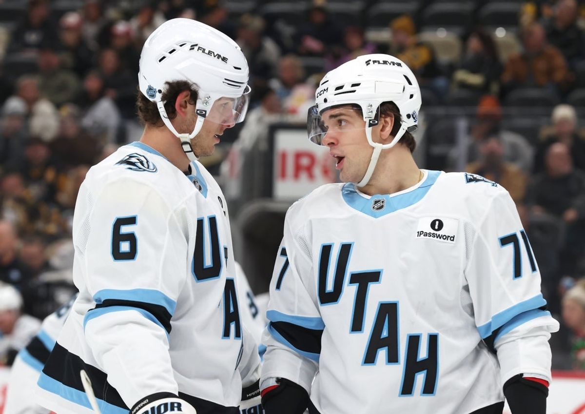 Dec 14, 2025; Pittsburgh, Pennsylvania, USA;  Utah Mammoth defenseman John Marino (6) and right wing JJ Peterka (77) talk on the ice against the Pittsburgh Penguins during the second period at PPG Paints Arena. Mandatory Credit: Charles LeClaire-Imagn Images