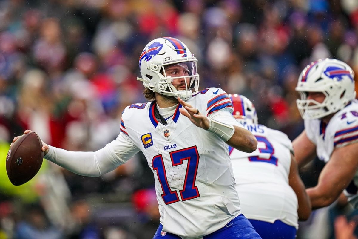 Dec 14, 2025; Foxborough, Massachusetts, USA; Buffalo Bills quarterback Josh Allen (17) passes the ball against the New England Patriots in the second half at Gillette Stadium. Mandatory Credit: David Butler II-Imagn Images