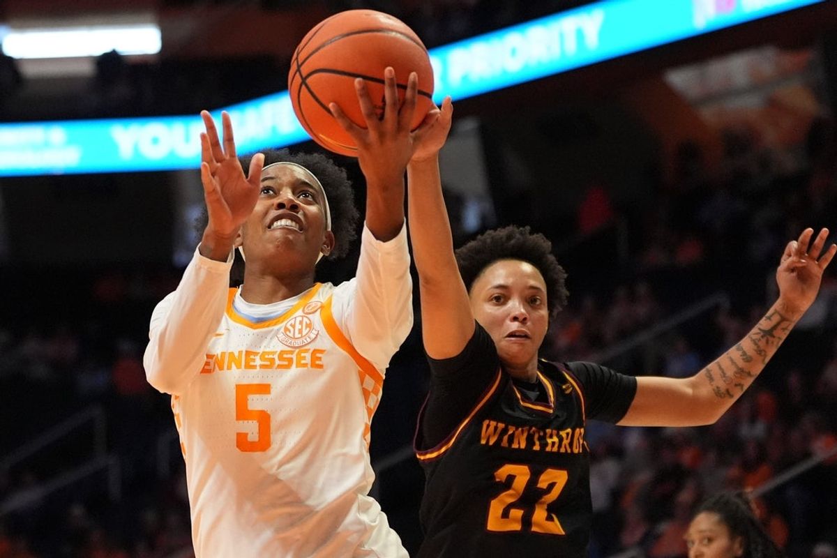 Tennessee guard Kaiya Wynn (5) tries to score while guarded by Winthrop guard Cori Lard (22) in an NCAA college basketball game on Dec. 14, 2025, in Knoxville, Tennessee.