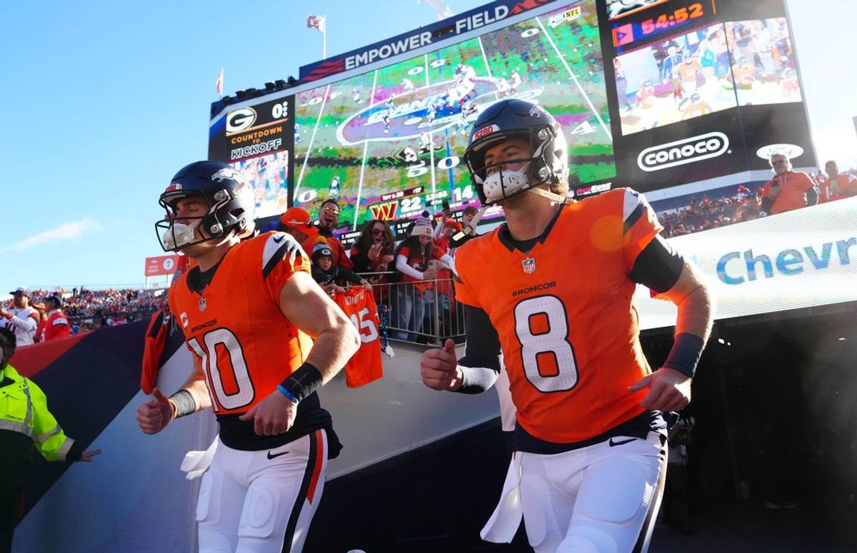 Dec 14, 2025; Denver, Colorado, USA; Denver Broncos quarterback Bo Nix (10) and quarterback Jarrett Stidham (8) run out for player introductions prior to a game against the Green Bay Packers at Empower Field at Mile High. Mandatory Credit: Ron Chenoy-Imagn Images