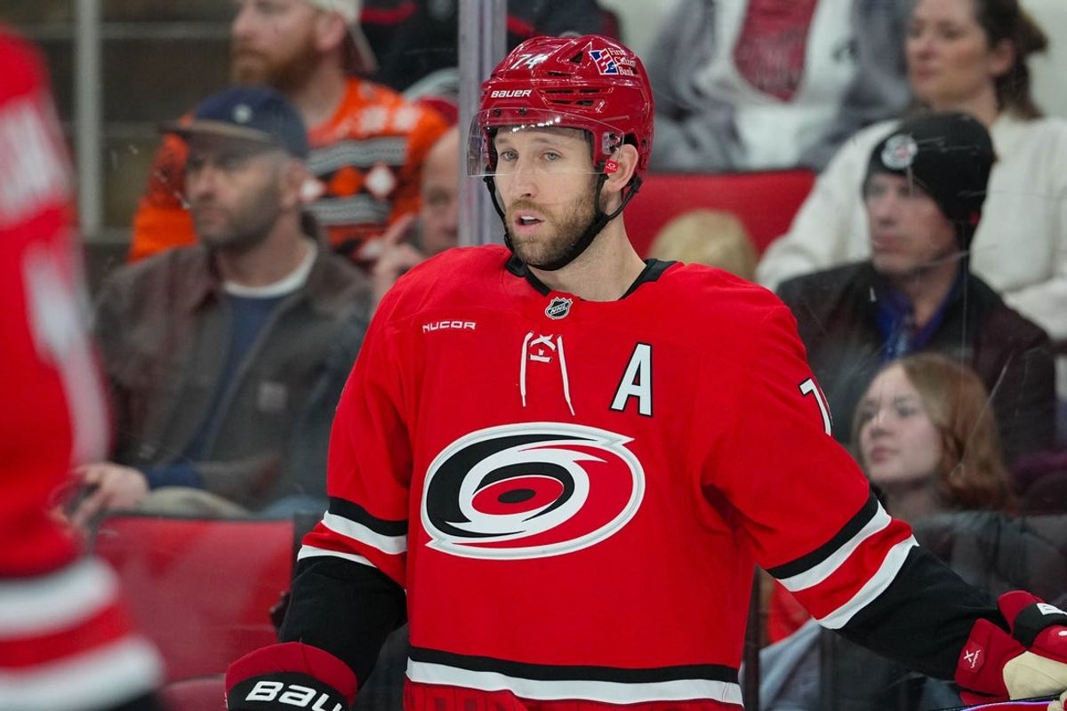 Dec 14, 2025; Raleigh, North Carolina, USA; Carolina Hurricanes defenseman Jaccob Slavin (74) looks on against the Philadelphia Flyers during the second period at Lenovo Center. Mandatory Credit: James Guillory-Imagn Images