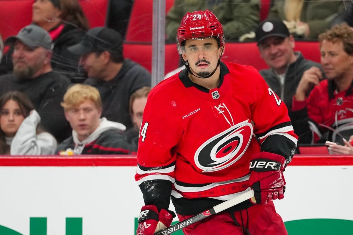 Dec 14, 2025; Raleigh, North Carolina, USA; Carolina Hurricanes center Seth Jarvis (24) skates against the Philadelphia Flyers during the second period at Lenovo Center. Mandatory Credit: James Guillory-Imagn Images