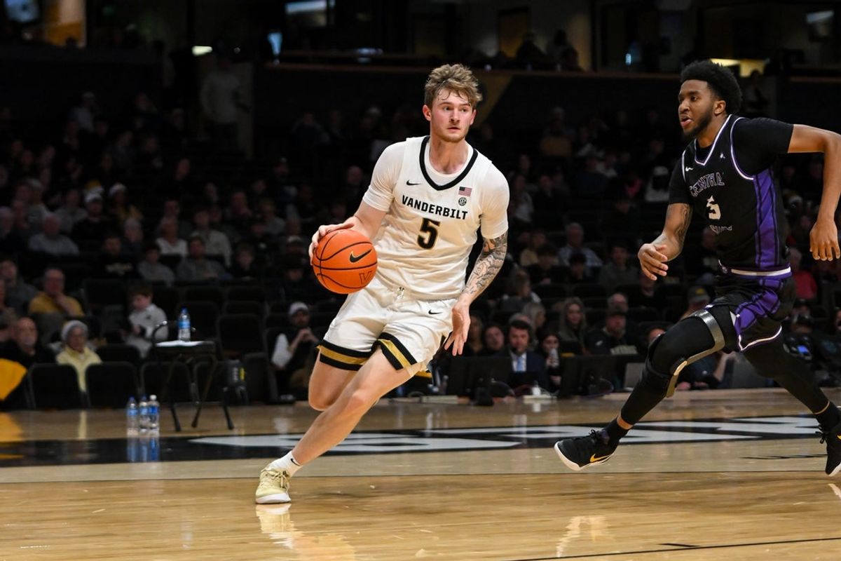 Dec 13, 2025; Nashville, Tennessee, USA;  Vanderbilt Commodores forward Tyler Nickel (5) drives to the basket against the Central Arkansas Bears during the second half at Memorial Gymnasium. Mandatory Credit: Steve Roberts-Imagn Images