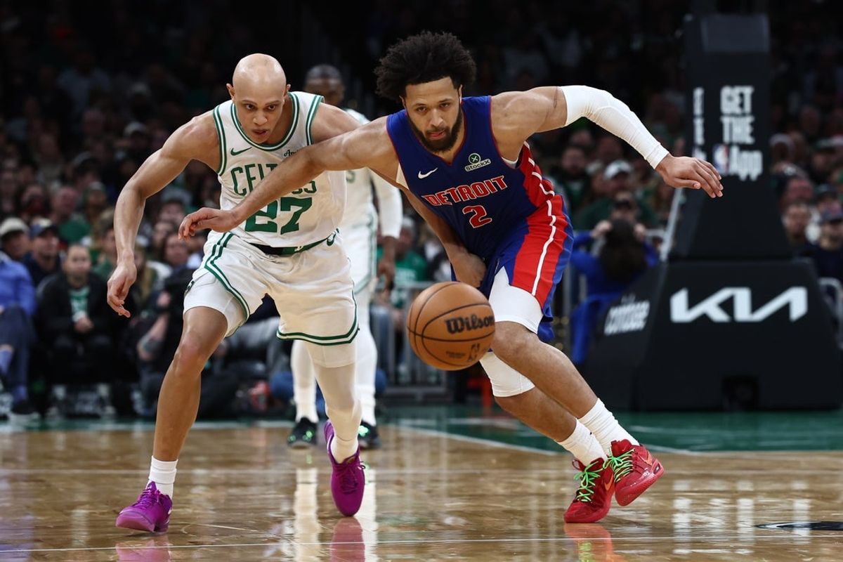 Dec 15, 2025; Boston, Massachusetts, USA; Detroit Pistons guard Cade Cunningham (2) and Boston Celtics guard Jordan Walsh (27) eye a loose ball during the second half at TD Garden. Mandatory Credit: Winslow Townson-Imagn Images