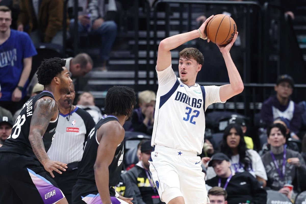 Dec 15, 2025; Salt Lake City, Utah, USA; Dallas Mavericks forward Cooper Flagg (32) looks for the play against the Utah Jazz during the second half at Delta Center. Mandatory Credit: Rob Gray-Imagn Images