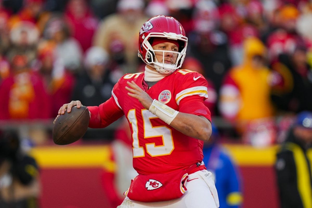 Dec 14, 2025; Kansas City, Missouri, USA; Kansas City Chiefs quarterback Patrick Mahomes (15) throws a pass during the second half against the Los Angeles Chargers at GEHA Field at Arrowhead Stadium. Mandatory Credit: Jay Biggerstaff-Imagn Images