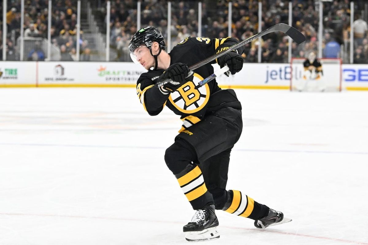 Dec 16, 2025; Boston, Massachusetts, USA; Boston Bruins center Morgan Geekie (39) breaks his stick on a power play slapshot against the Utah Mammoth during the first period at TD Garden. Mandatory Credit: Eric Canha-Imagn Images