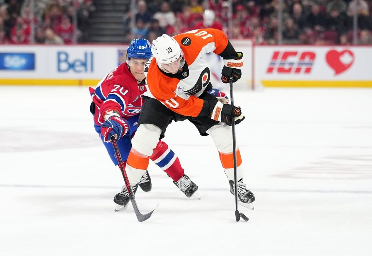 Dec 16, 2025; Montreal, Quebec, CAN; Montreal Canadians forward Juraj Slafkovsky (20) pressures Philadelphia Flyers forward Bobby Brink (10) during the first period at the Bell Centre. Mandatory Credit: Eric Bolte-Imagn Images