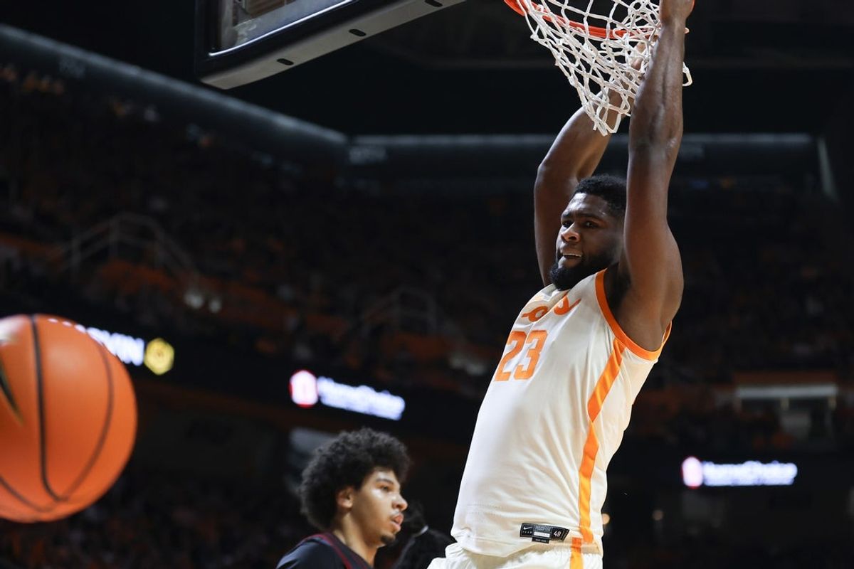 Dec 16, 2025; Knoxville, Tennessee, USA;  Tennessee Volunteers forward Jaylen Carey (23) dunks the ball against the Louisville Cardinals during the first half at Thompson-Boling Arena at Food City Center. Mandatory Credit: Randy Sartin-Imagn Images