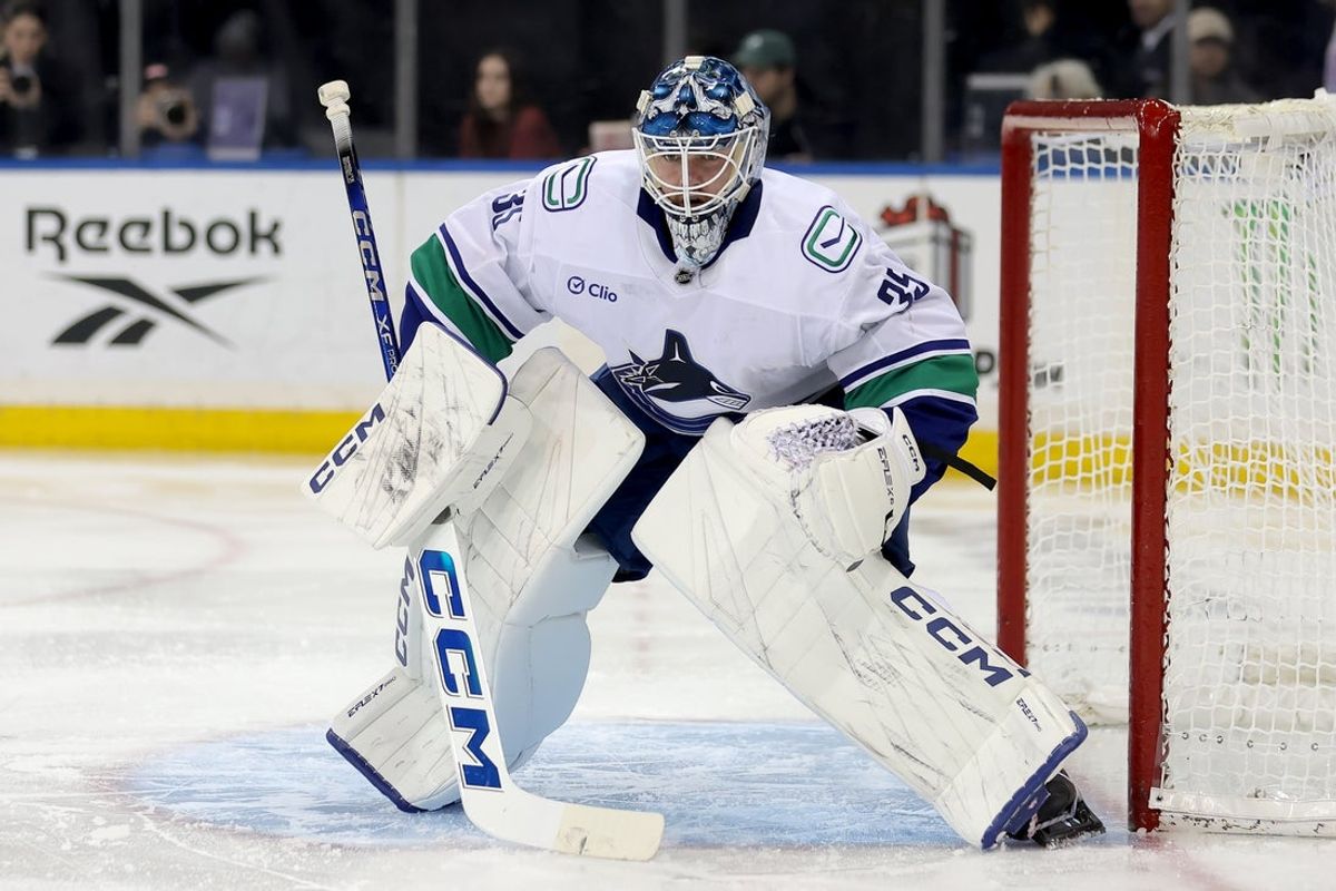Dec 16, 2025; New York, New York, USA; Vancouver Canucks goaltender Thatcher Demko (35) tends net against the New York Rangers during the second period at Madison Square Garden. Mandatory Credit: Brad Penner-Imagn Images