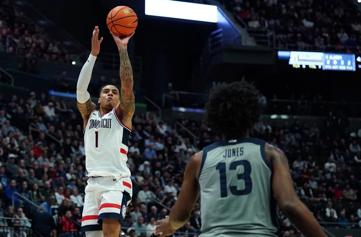 Dec 16, 2025; Storrs, Connecticut, USA; UConn Huskies guard Solo Ball (1) shoots the ball against the Butler Bulldogs in the first half at Harry A. Gampel Pavilion. Mandatory Credit: David Butler II-Imagn Images