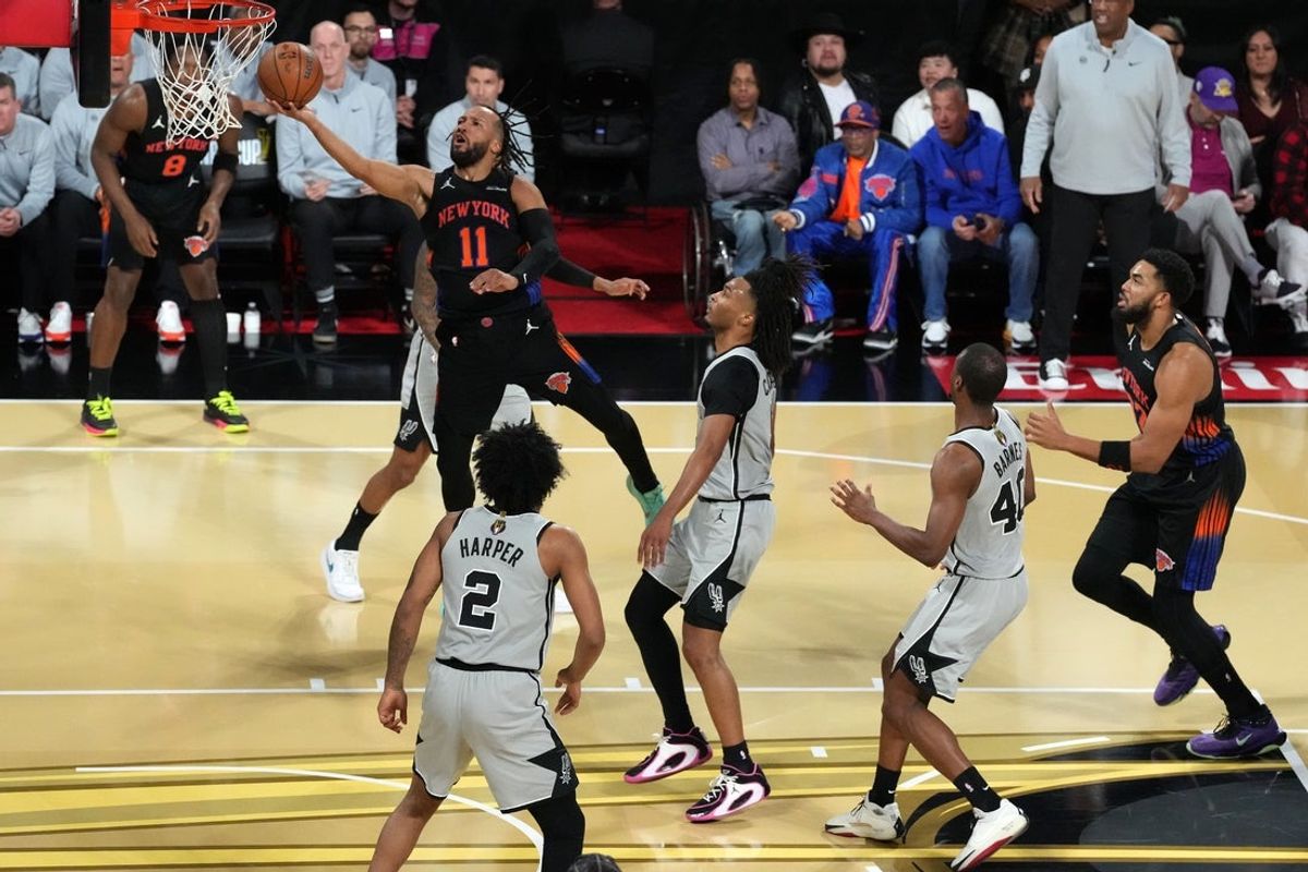 Dec 16, 2025; Las Vegas, Nevada, USA; New York Knicks guard Jalen Brunson (11) shoots the ball against the San Antonio Spurs in the first half during the Emirates NBA Cup Final at T-Mobile Arena. Mandatory Credit: Kirby Lee-Imagn Images