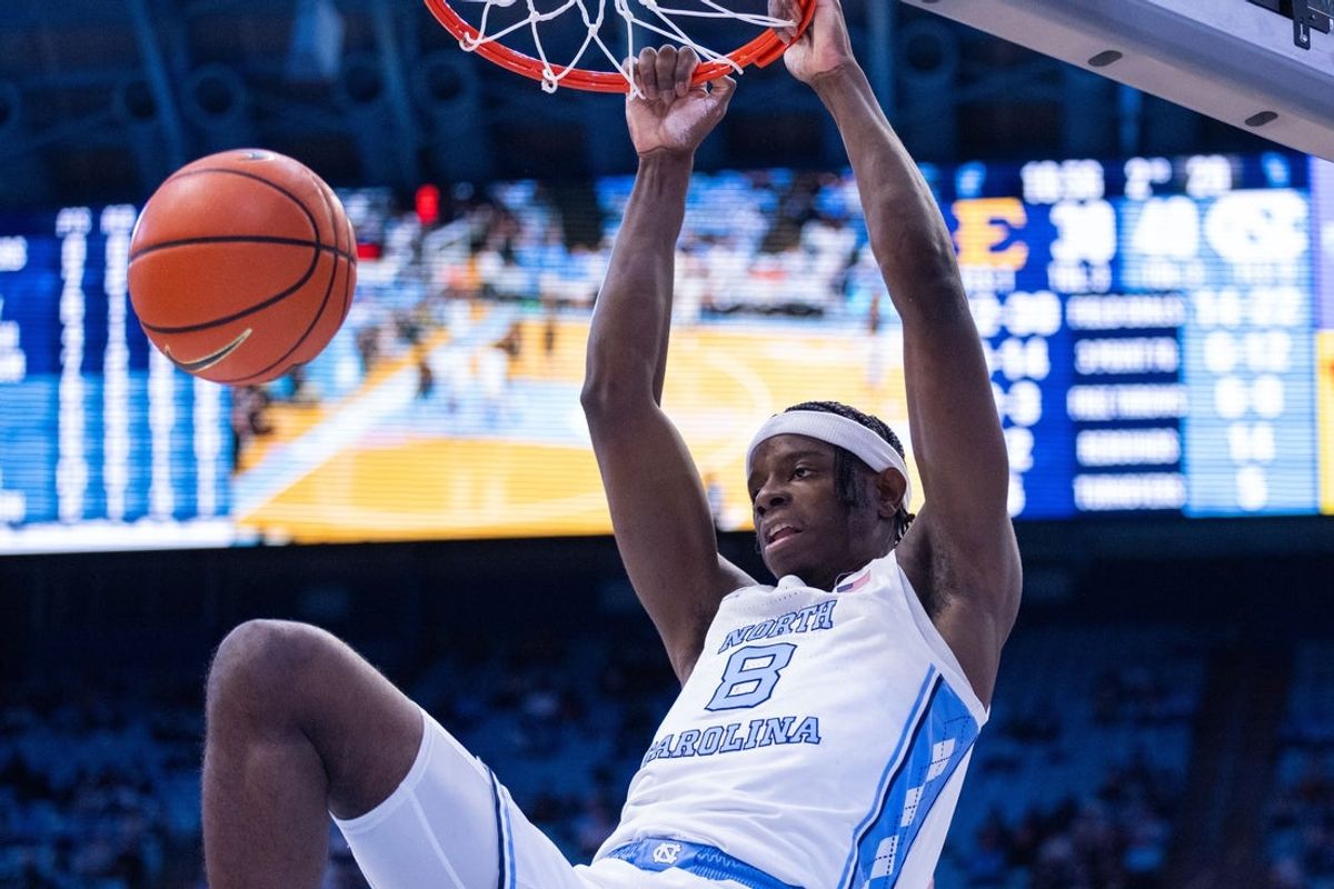 Dec 16, 2025; Chapel Hill, North Carolina, USA; North Carolina Tar Heels forward Caleb Wilson (8) dunks during the second half against the ETSU Buccaneers at Dean E. Smith Center. Mandatory Credit: Scott Kinser-Imagn Images