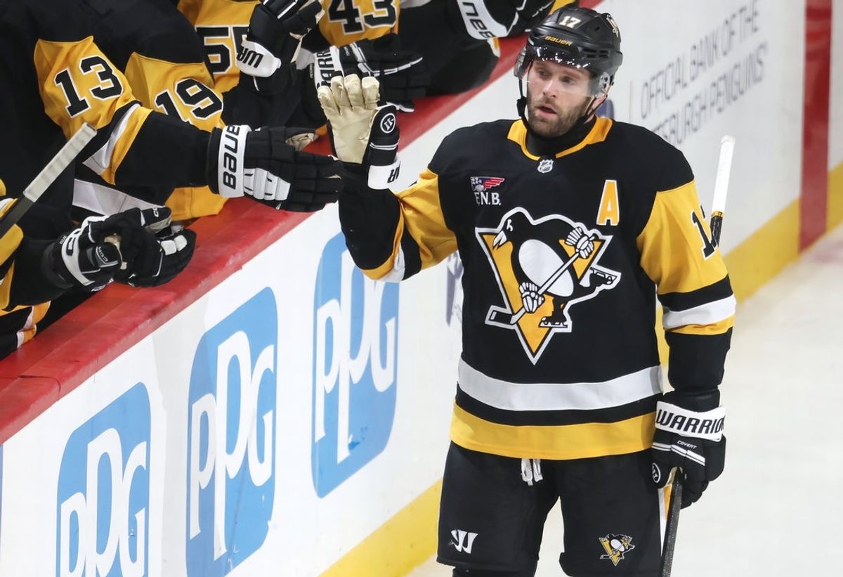 Dec 16, 2025; Pittsburgh, Pennsylvania, USA;  Pittsburgh Penguins right wing Bryan Rust (17) celebrates his goal with the Penguins bench against the Edmonton Oilers during the third period at PPG Paints Arena. Mandatory Credit: Charles LeClaire-Imagn Images