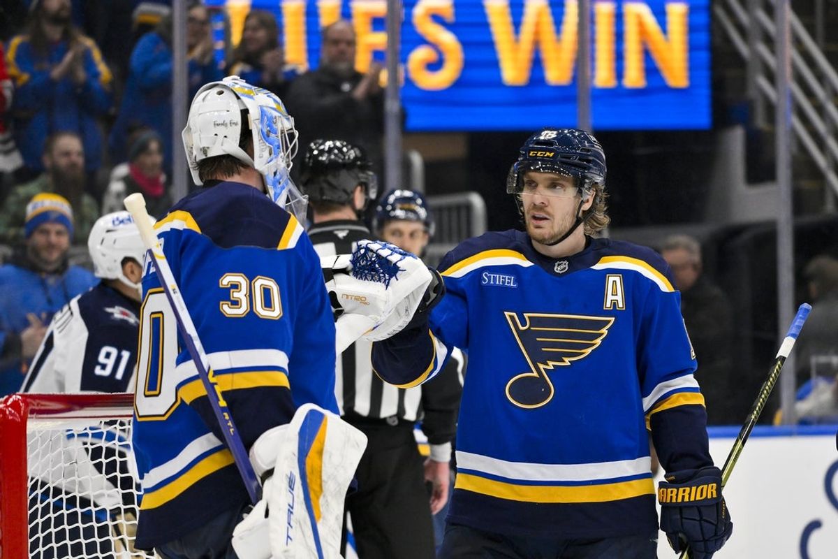 Dec 17, 2025; St. Louis, Missouri, USA; St. Louis Blues center Robert Thomas (18) celebrates with goaltender Joel Hofer (30) after the Blues defeated the Winnipeg Jets at Enterprise Center. Mandatory Credit: Jeff Curry-Imagn Images