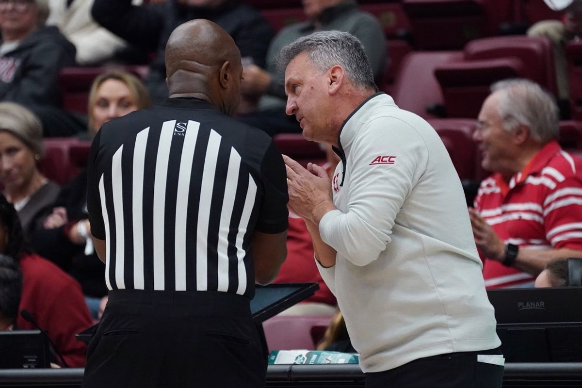 Dec 17, 2025; Stanford, California, USA;  Stanford Cardinal head coach Kyle Smith pleads with the referee during a game against the Texas-Arlington Mavericks in the second half at Maples Pavilion. Mandatory Credit: David Gonzales-Imagn Images