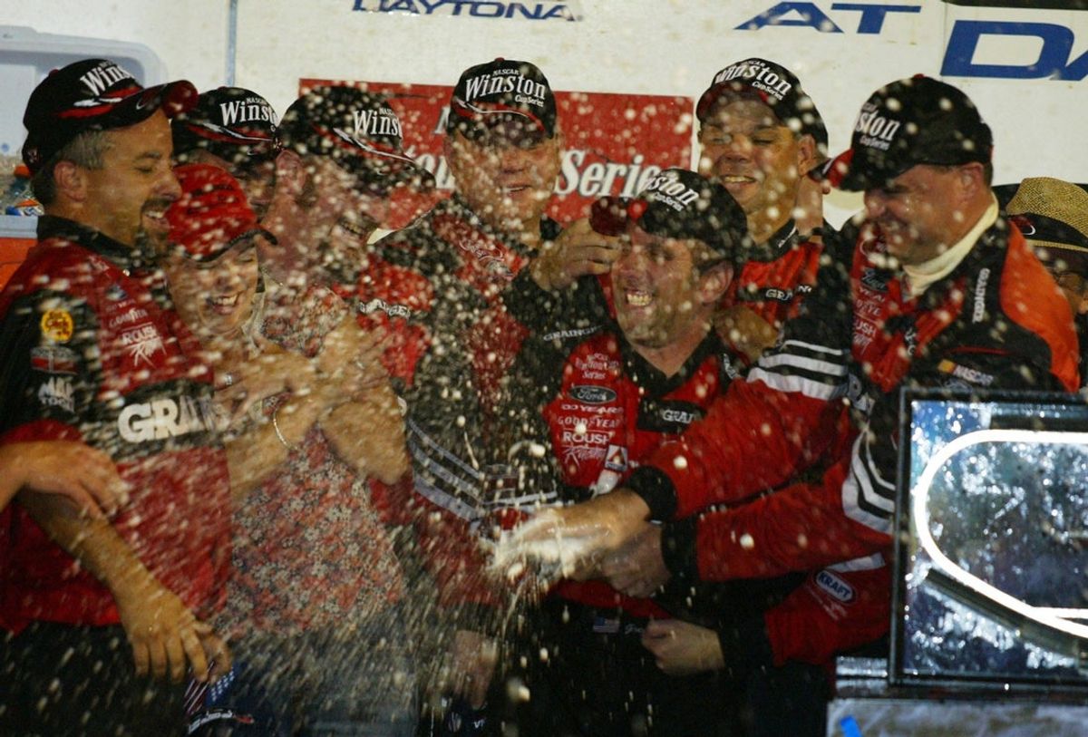 As a NASCAR Cup rookie driver, Greg Biffle celebrates in victory lane after winning the Pepsi 400 at Daytona International Speedway in Daytona Beach on July 5, 2003.