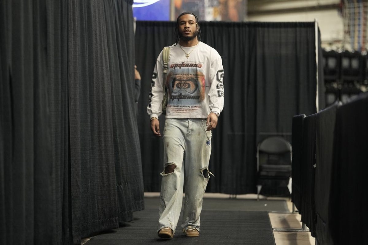 Dec 18, 2025; San Antonio, Texas, USA; Washington Wizards guard Cam Whitmore (1) enters Frost Bank Center before a game against the San Antonio Spurs. Mandatory Credit: Scott Wachter-Imagn Images