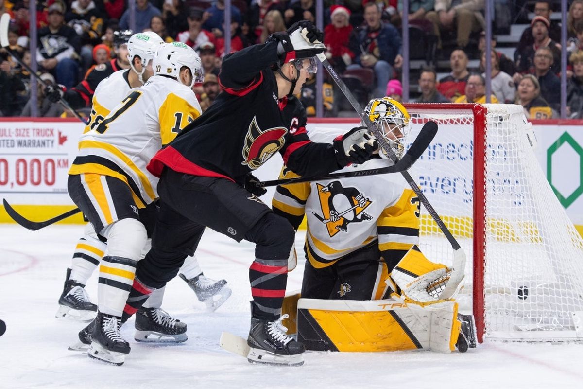 Dec 18, 2025; Ottawa, Ontario, CAN; Ottawa Senators left wing Brady Tkachuk (7) scores against  Pittsburgh Penguins goalie Arturs Silovs (37) in the first period at the Canadian Tire Centre. Mandatory Credit: Marc DesRosiers-IMAGN Images
