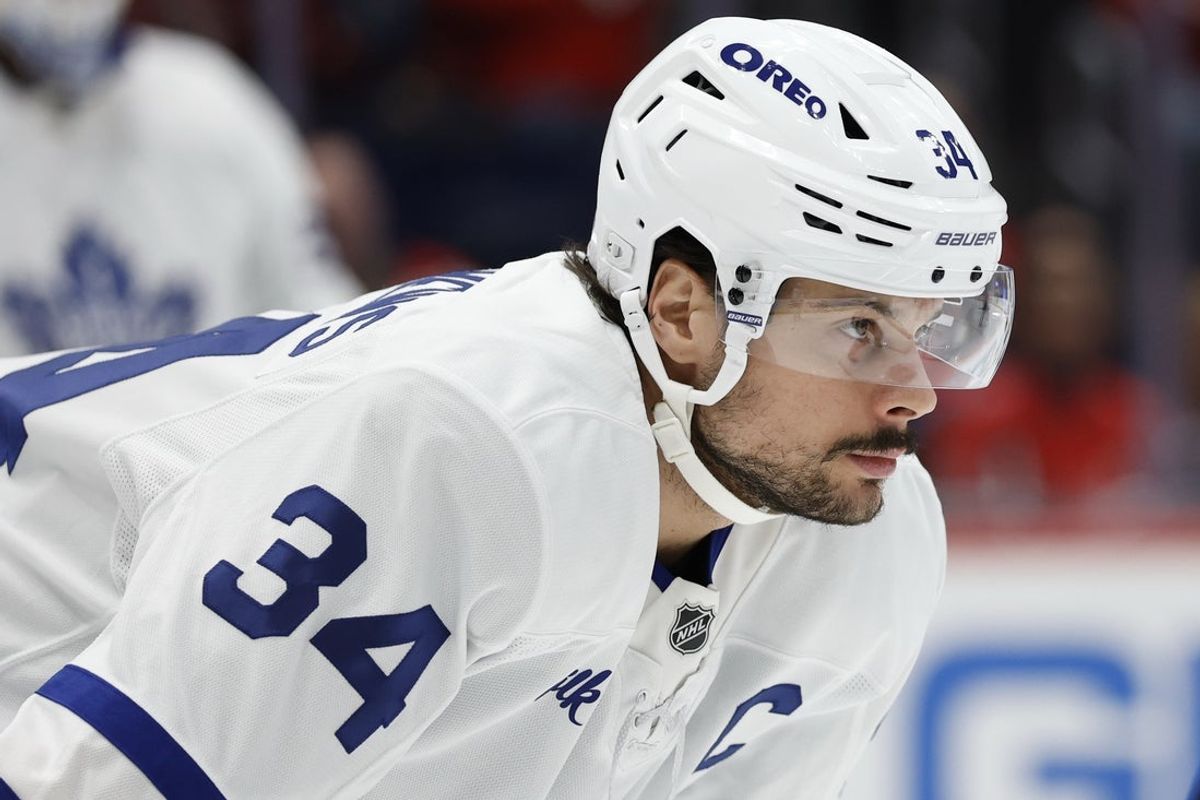 Dec 18, 2025; Washington, District of Columbia, USA; Toronto Maple Leafs center Auston Matthews (34) lines up for a face-off against the Washington Capitals during the first period at Capital One Arena. Mandatory Credit: Geoff Burke-Imagn Images