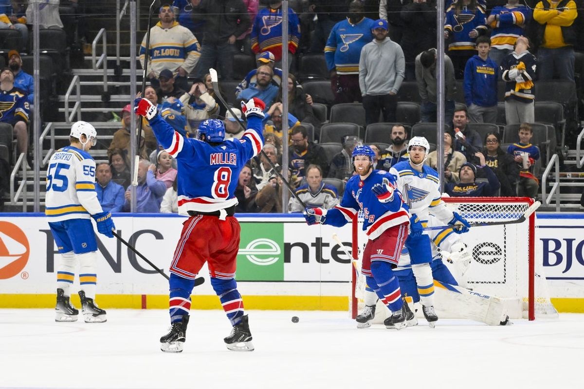 Dec 18, 2025; St. Louis, Missouri, USA; New York Rangers left wing J.T. Miller (8) reacts after scoring the game winning goal against the St. Louis Blues during overtime at Enterprise Center. Mandatory Credit: Jeff Curry-Imagn Images